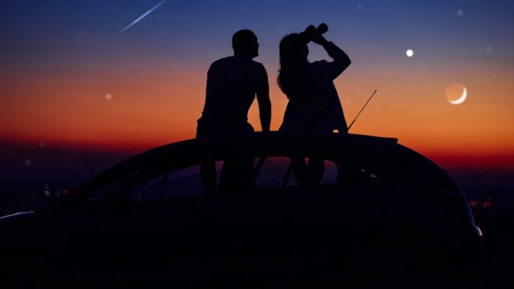 persone sul tettuccio dell'automobile
